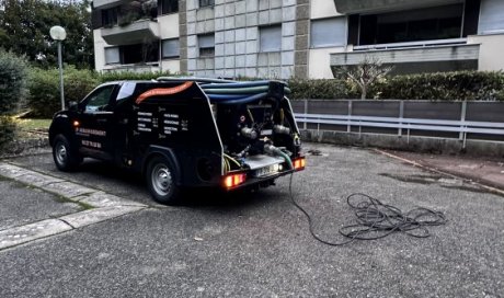 curage de canalisation eaux pluviales dans un sous sol de copro à Vaulx-Milieu