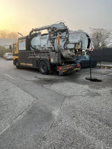 curage d'un réseau d'eau pluviale dans un lotissement pour entretien à Frontonas