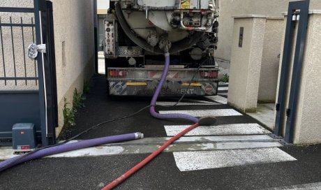 nettoyage d'un puits perdu et décompactage du fond boucher par de la laitance dans une copropriété à Luzinay