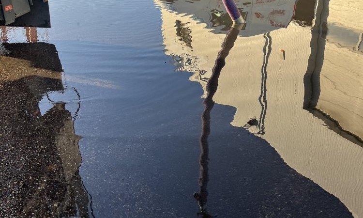 pompage d'eau et nettoyage de 3 puits perdu suite a une inondation dans une entreprise à Saint Laurent de Mure 