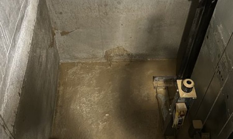 vidange et nettoyage d'une cage ascenseur suite a une inondation à Saint Georges d'Esperanche  
